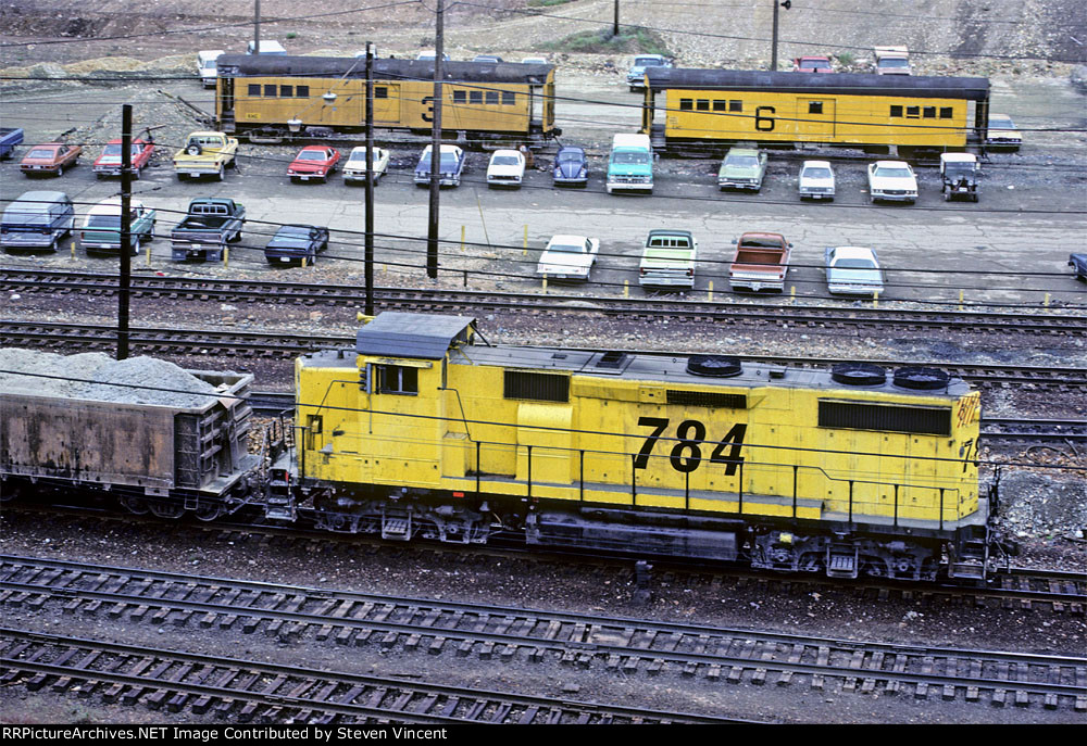 Kennecott Copper hi-cab GP39-2 #784. Mining crew transport cars in background.